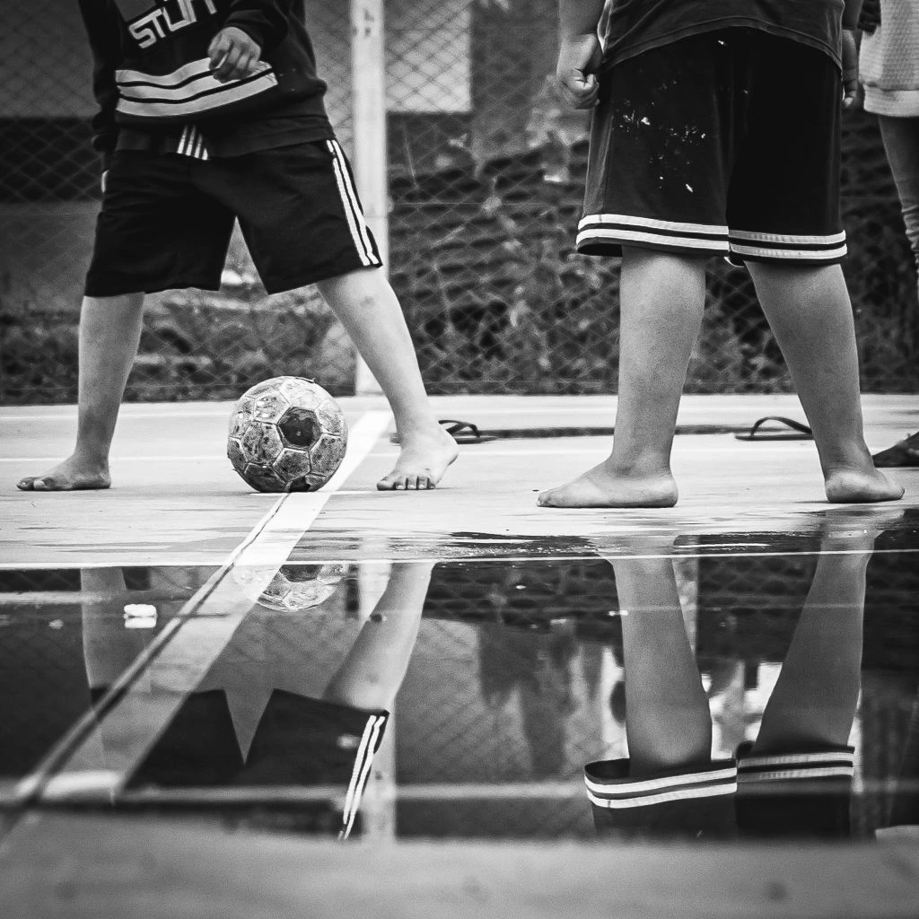 Goalkeeper in a Travel training kit training inside a Lake Norman futsal facility.